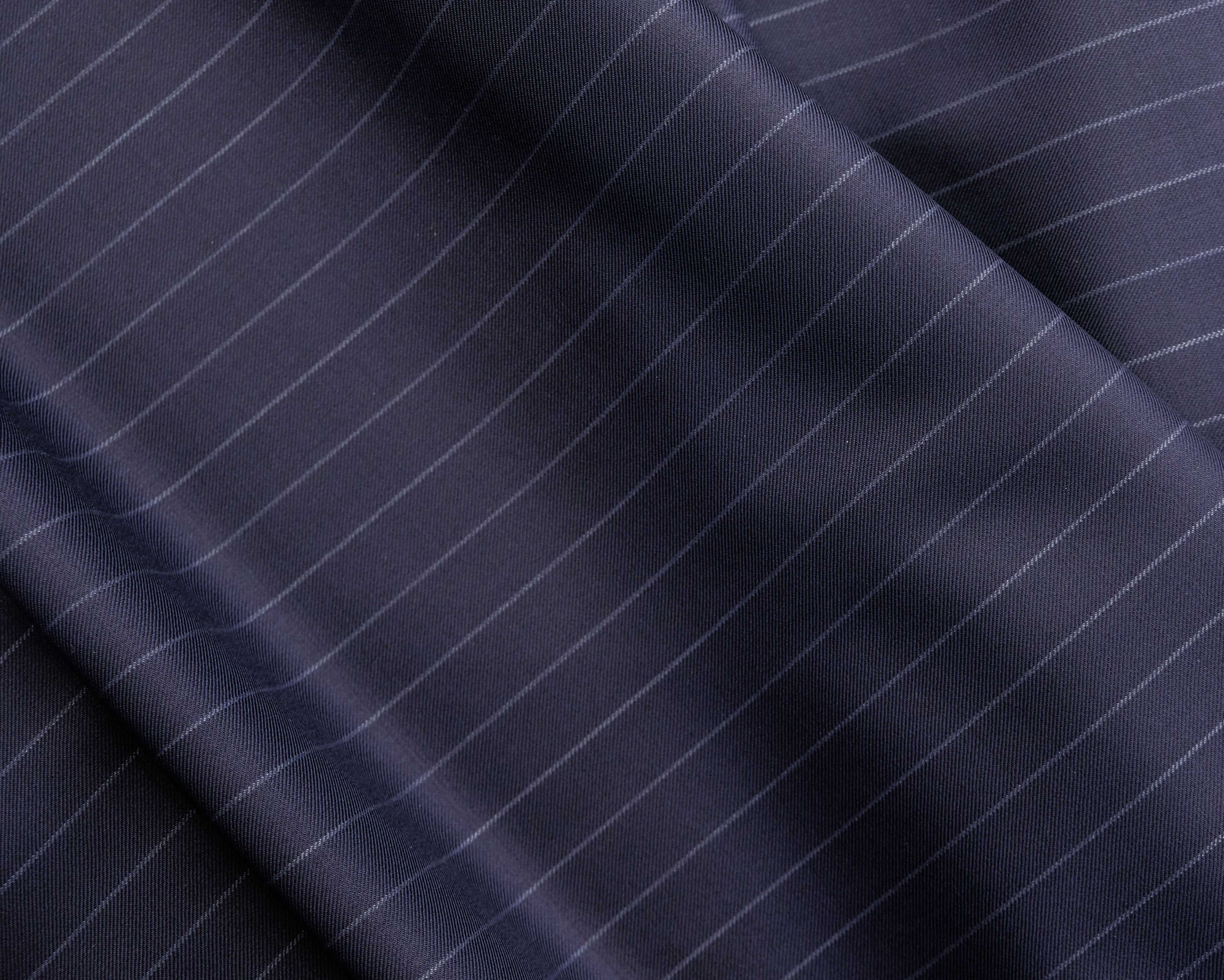 Premium fabric rolls at Galaxy Mens Wear
